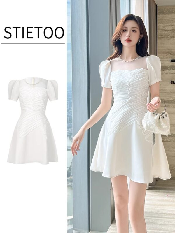 White dress 2025 summer new women's French design small waisted and fluffy dress