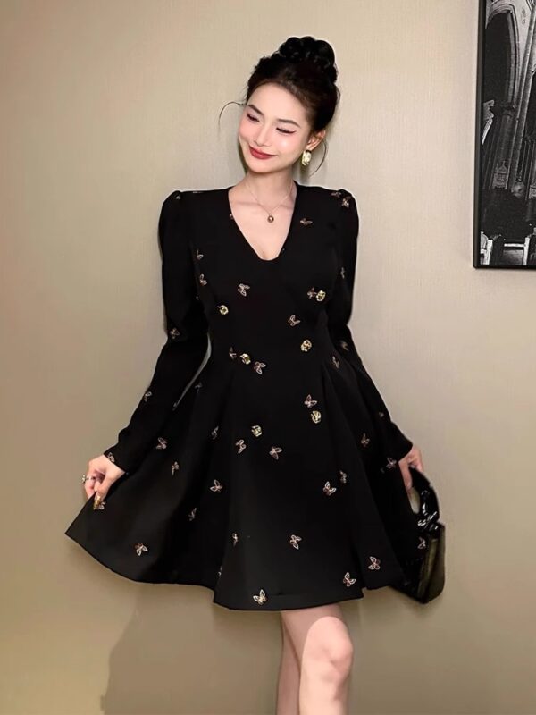 European station V-neck dress Spring new women's butterfly niche without the same style waist-happy A-line Hepburn style small black skirt