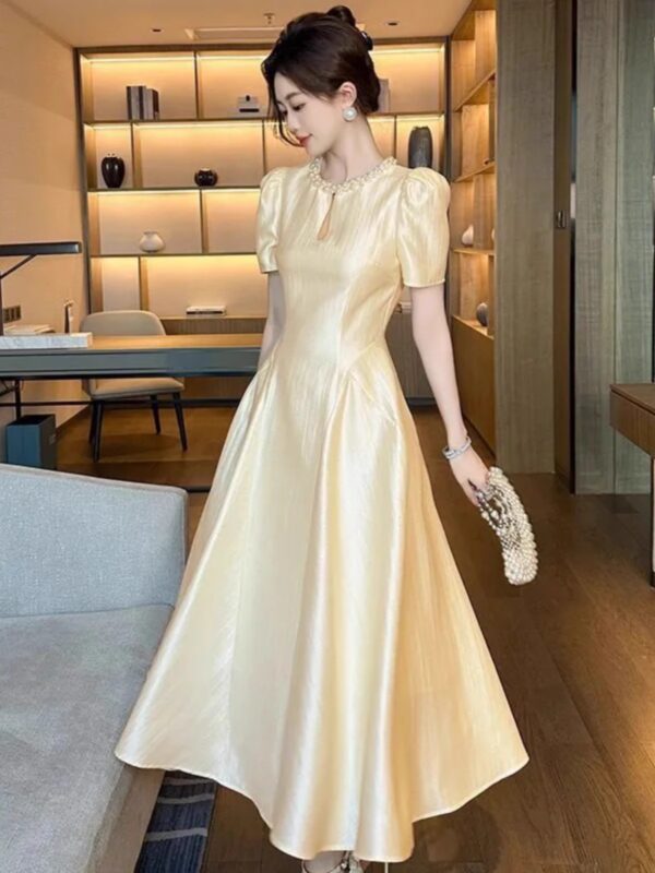 Tea break long skirt 2025 summer new women's French style round neck waist draped over-knee dress - Image 2