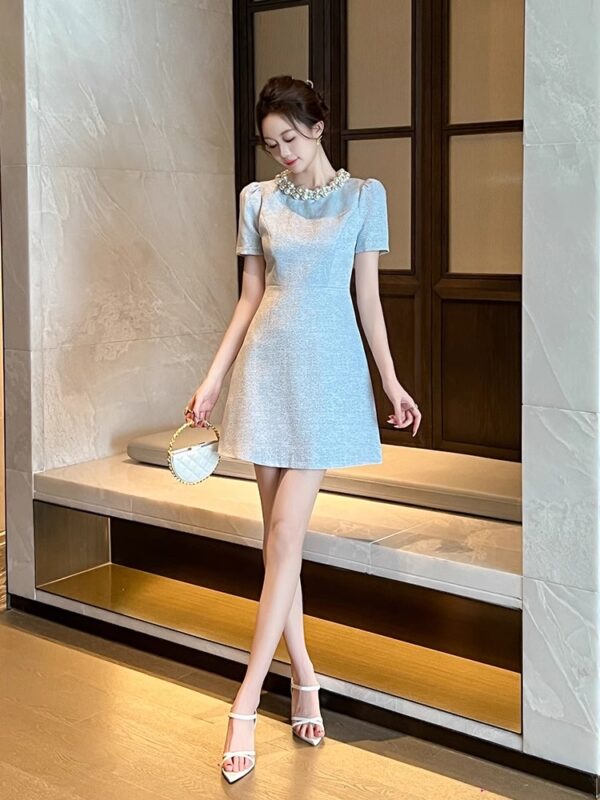 A-line dress with a celebrity girl with a waist 2025 new style women's summer French round neck beaded small temperament short skirt