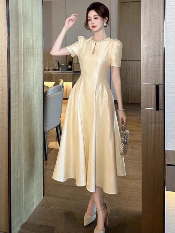 Tea break long skirt 2025 summer new women's French style round neck waist draped over-knee dress - Image 3