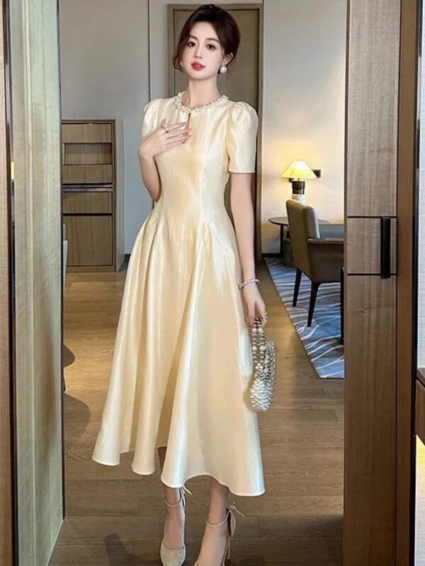 Tea break long skirt 2025 summer new women's French style round neck waist draped over-knee dress - Image 4
